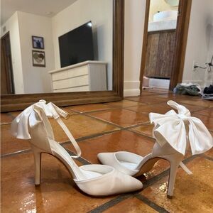 Meshki White Satin Heels with Bow Accent
